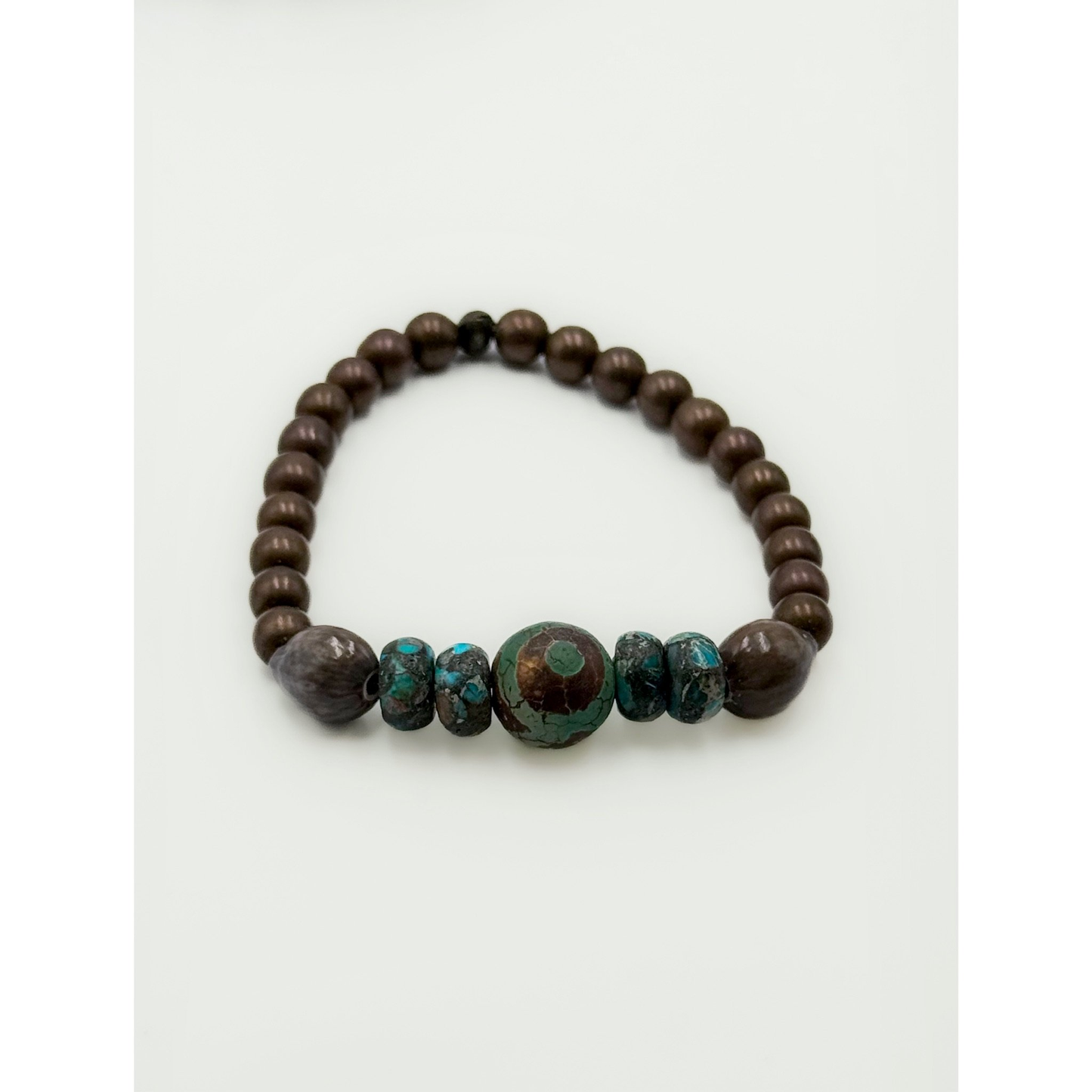 Bronze Hematite, African Turquoise, Chwabasi Seed with a Picasso Jasper Center Bead Bracelet