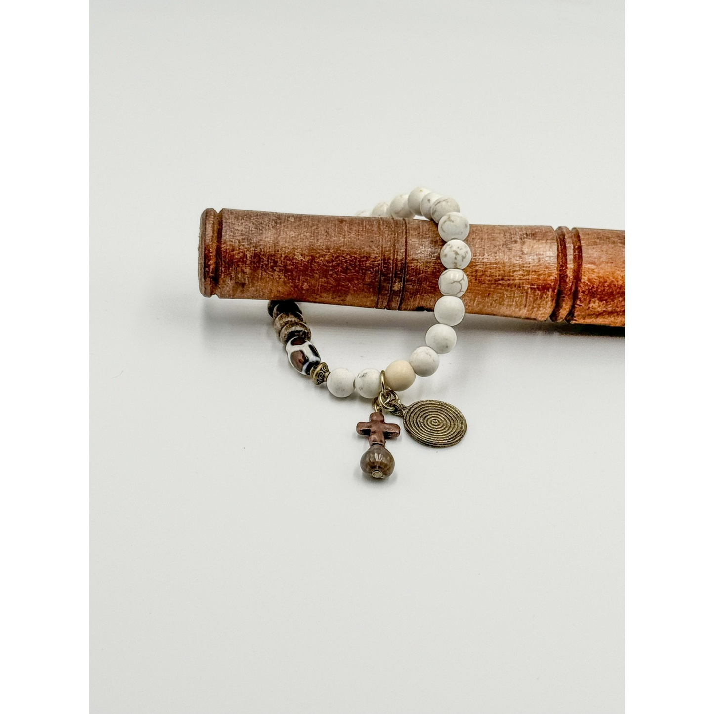 White Howlite, Coconut Wood and Giraffe Agate Beads with Chwabasi Seed and Broze Accent Charms