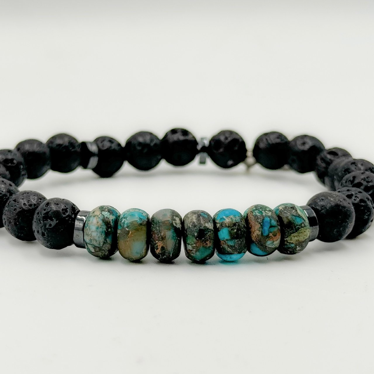 Black Lava and African Turquoise Bead Bracelet with Signature Chwabasi Seed