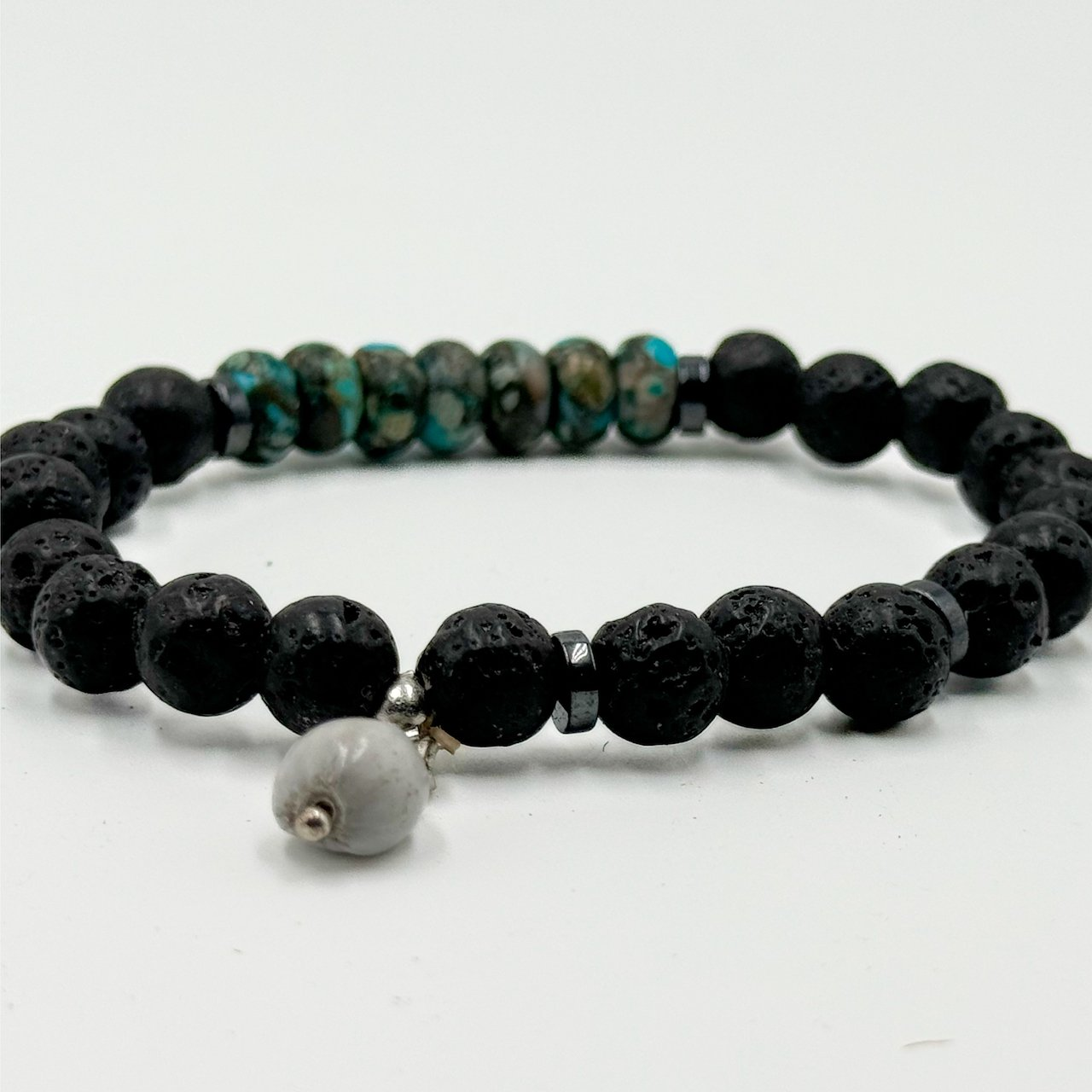 Black Lava and African Turquoise Bead Bracelet with Signature Chwabasi Seed