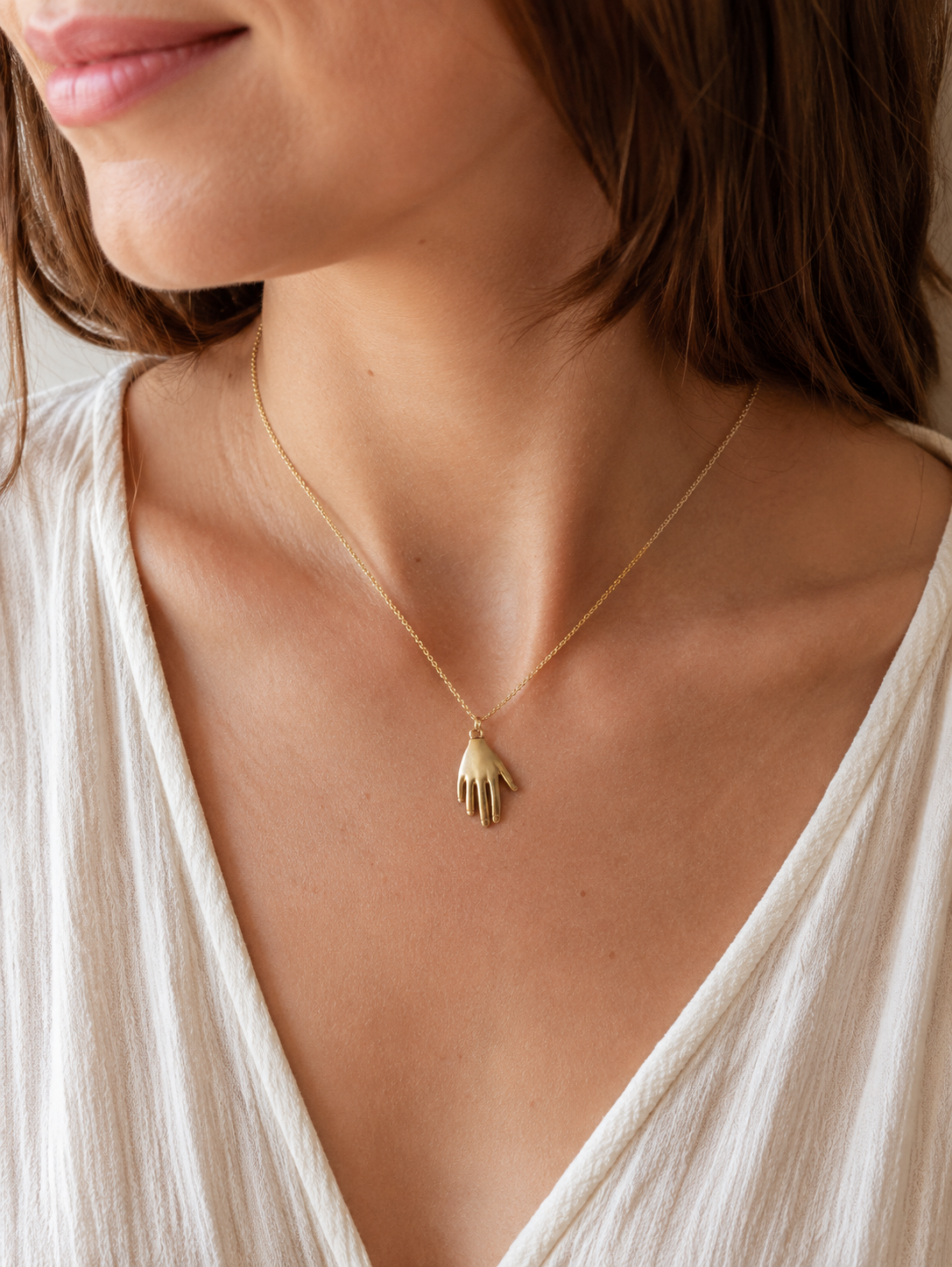 Golden Hand Charm